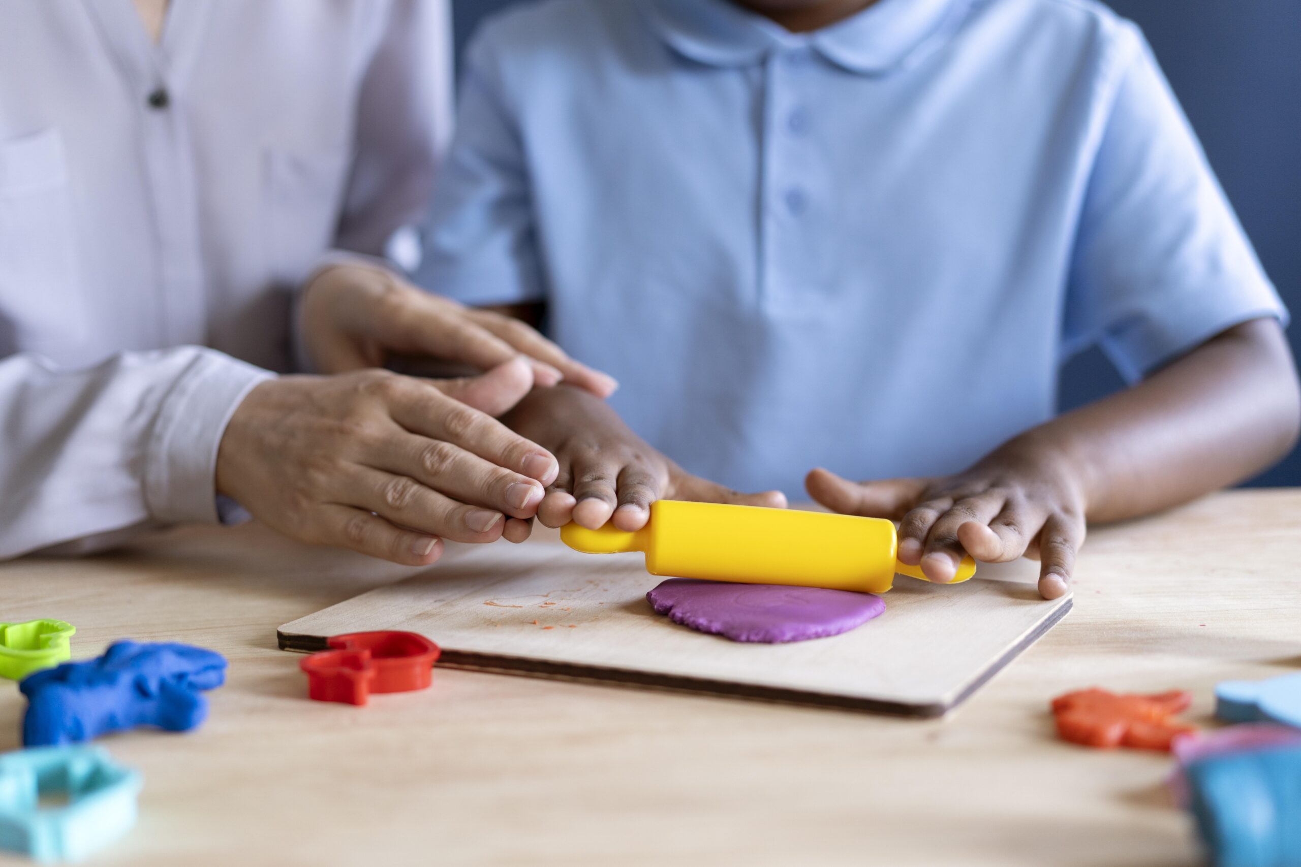 boy-doing-occupational-therapy-session-with-psychologist